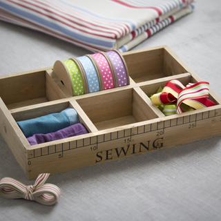 craft room with sewing storage box elastic band ribbons and craft kit