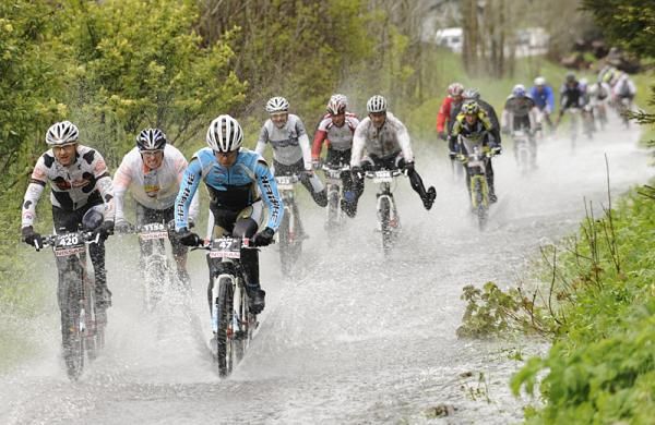 Racers plow through a wet section of stage 2 of the Trans Germany