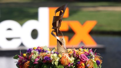 The FedEx St. Jude Championship trophy on a stool