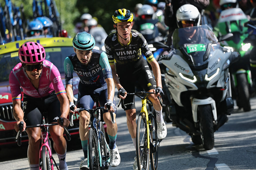 EF Education - EasyPost rider Richard Carapaz (L), Team Visma | Lease a Bike's US rider Sepp Kuss (R) and Bahrain - Victorious team's French rider Lenny Martinez (C) in the lead breakaway in the Alpe d'Huez