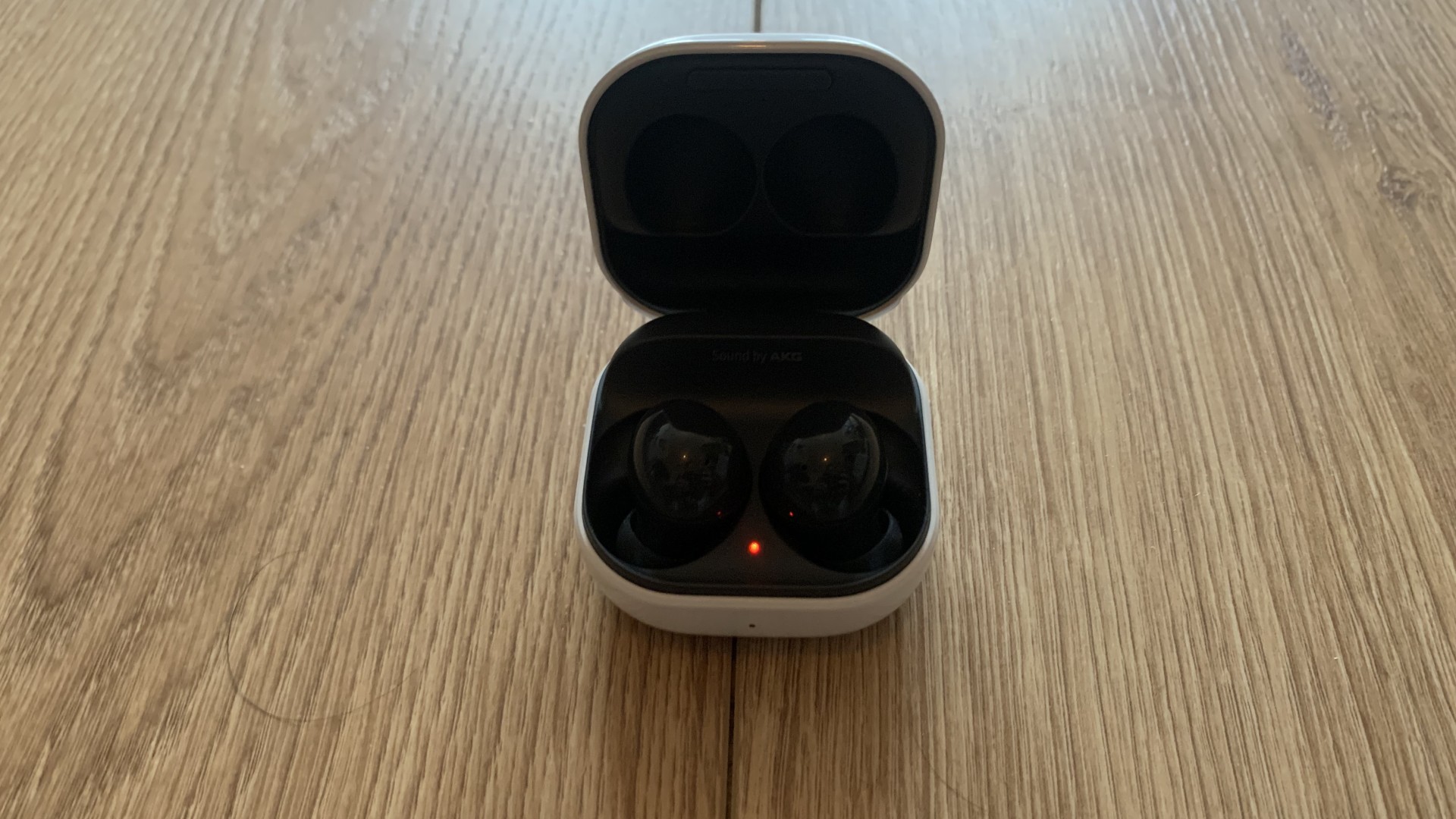 Samsung Galaxy Buds2 in case with lid open charging