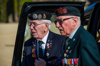 EMRWWW Rick Forest, 89 D-day, and Charles Jeffries, 93 D-day/Dessert Rat (Left) arrive by taxi - Second World War Veterans, and serving Guardsmen on Horse Guards Parade Ground to highlight Royal British Legion events on Victory in Europe (VE) Day. The Legion is also announcing that veterans and their carers will receive funding towards attending the event on the weekend of the 8-10th May. Places will be available for a series of commemorative events over the weekend including on VE Day itself, Friday 8 May, when a Service of Remembrance will be held at The Cenotaph, with a national two minute silenc