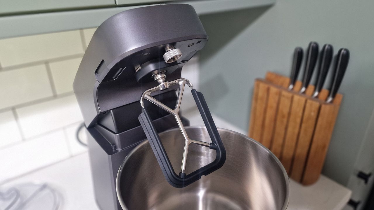 The Ooni Halo Pro Spiral mixer being tested in a green and white kitchen