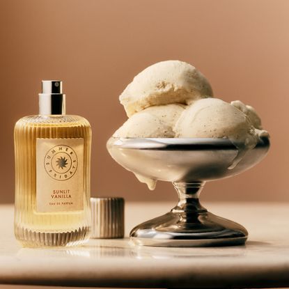 Summer Fridays sunlit vanilla perfume bottle with bowl of ice cream