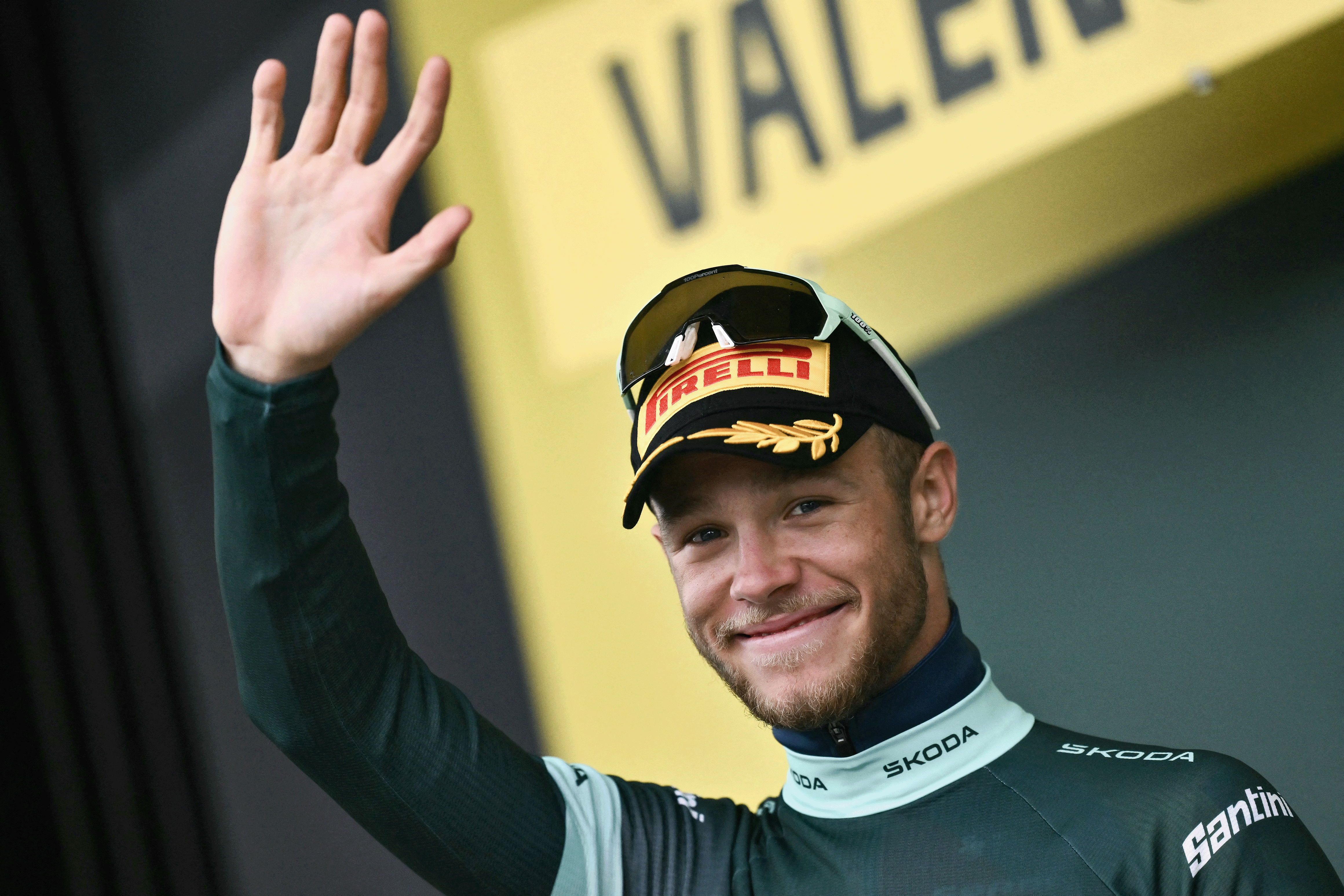 Lidl - Trek team's Italian rider Jonathan Milan celebrates on the podium with the best sprinter's green jersey after the 17th stage of the 112th edition of the Tour de France cycling race, 160.4 km between Bollene and Valence, southern France, on July 23, 2025. (Photo by Marco BERTORELLO / AFP) (Photo by MARCO BERTORELLO/AFP via Getty Images)