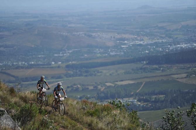 Thomas Frischknecht and Urs Grieg of Team Rwanda Cycling 2