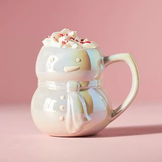 A festive mug in the style of a snowman