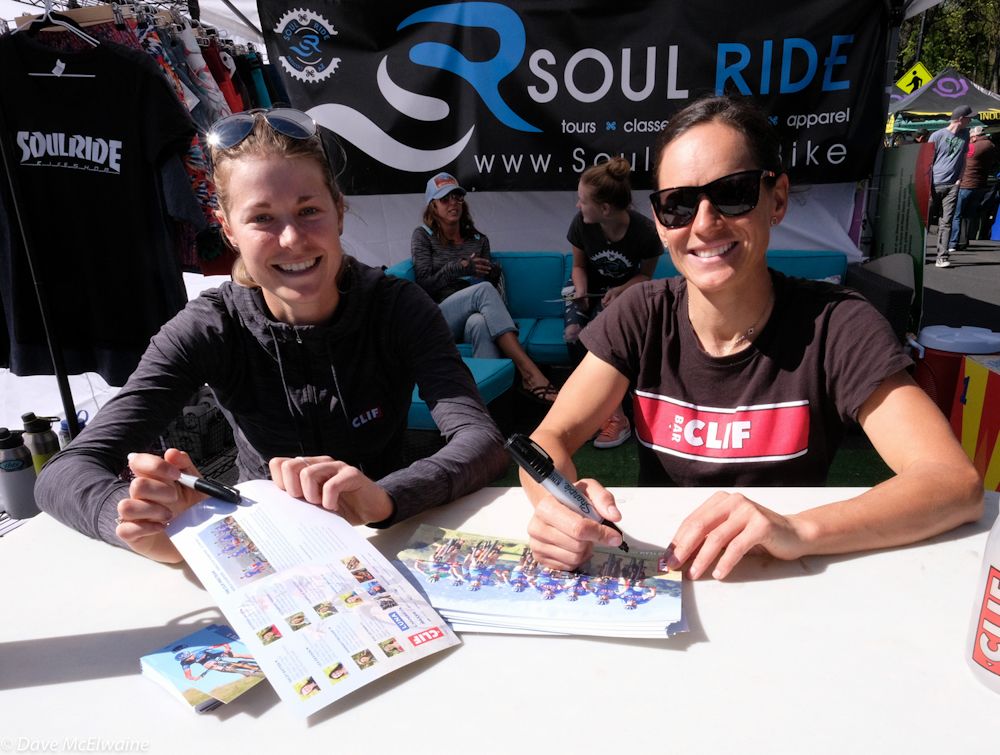 Maghalie Rochette and Clif team-mate Katerina Nash signing autographs before the race