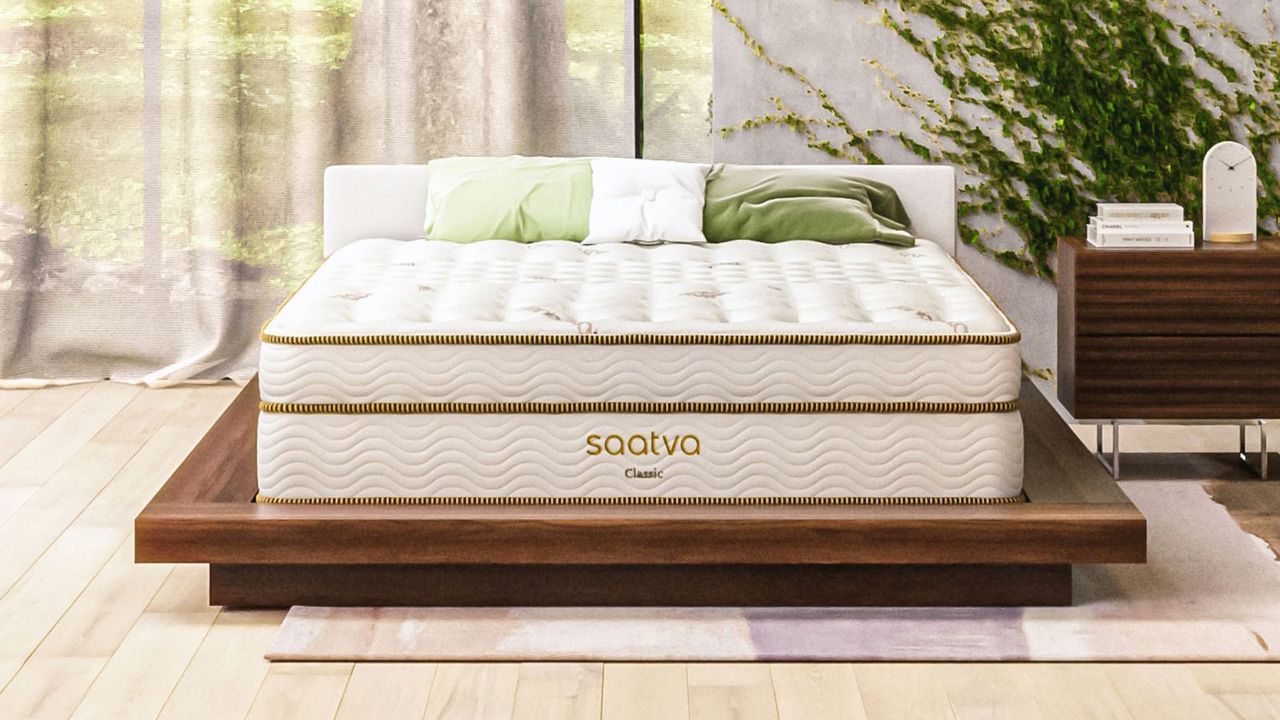 Saatva Classic Mattress against a white wall.