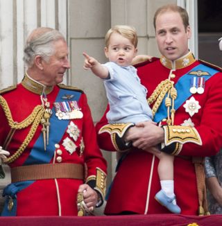 Prince Charles, Prince of Wales with Prince William, Duke of Cambridge and Prince George of Cambridge during the annual Trooping The Colour ceremony at Buckingham Palace on June 13, 2015 in London, England