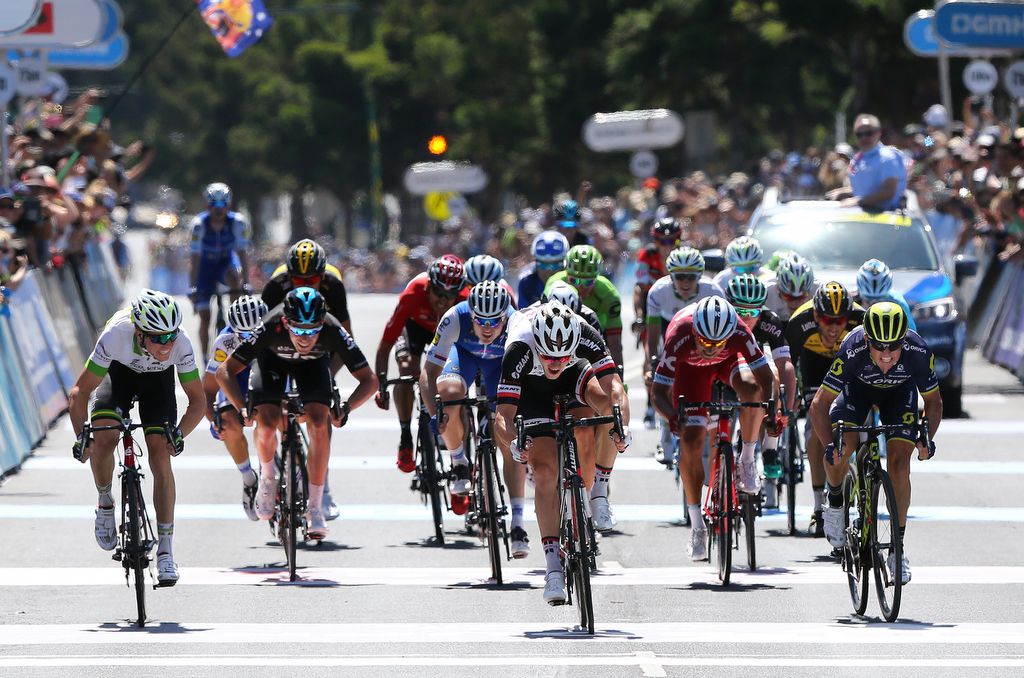 Nikias Arndt (Team Sunweb) throws the front wheel to get the win