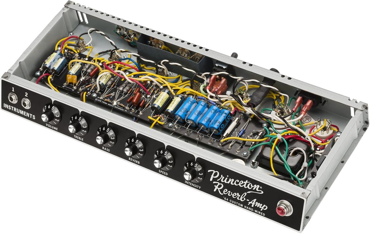 Look at those Fender Blue tone capacitors. Look at the wiring. Fender's Corona, California factory has done a lovely job