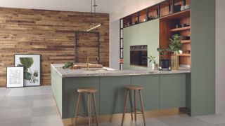 green kitchen with wraparound peninsula