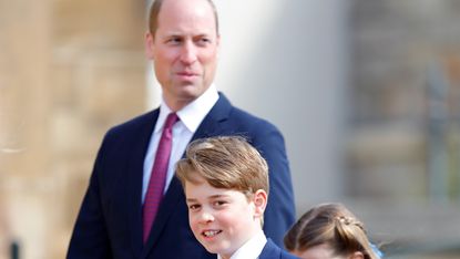 Prince William and Prince George at an event