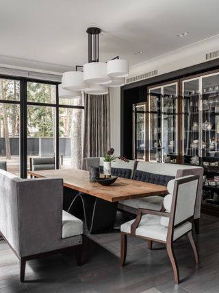 grey dining room with dining sofas by O&A Design