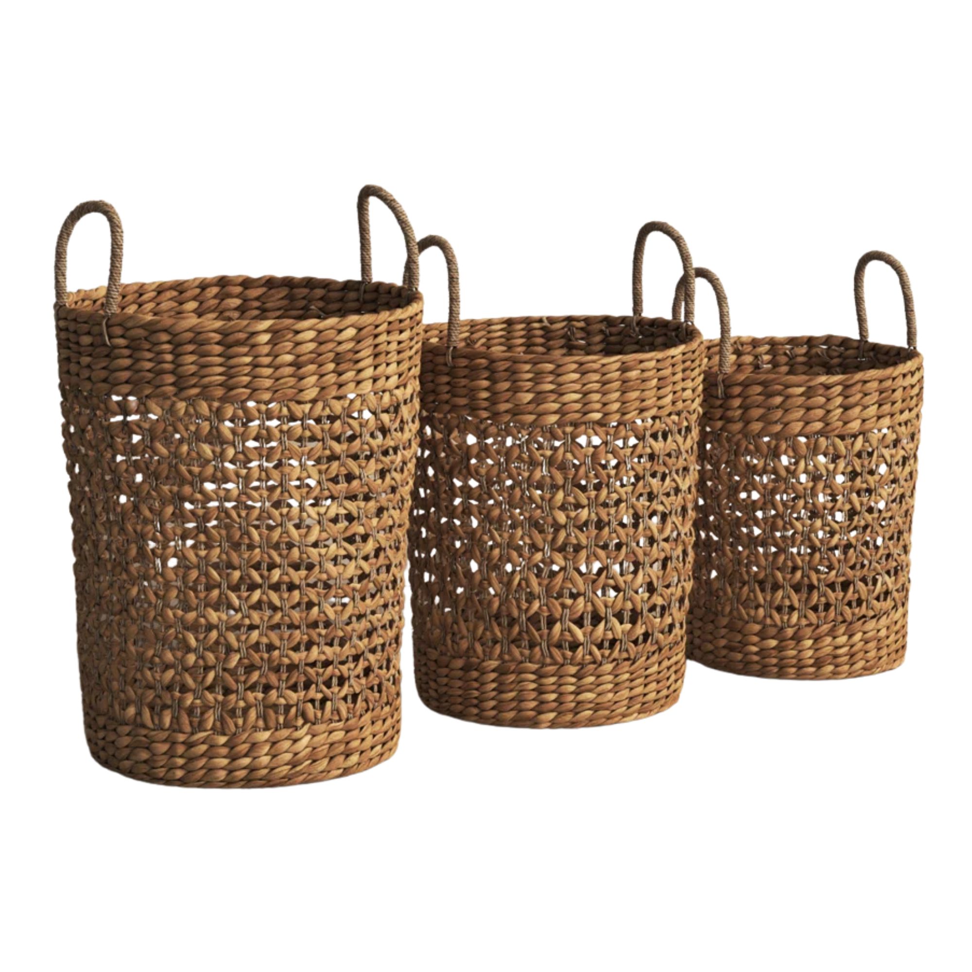 Three wicker storage baskets