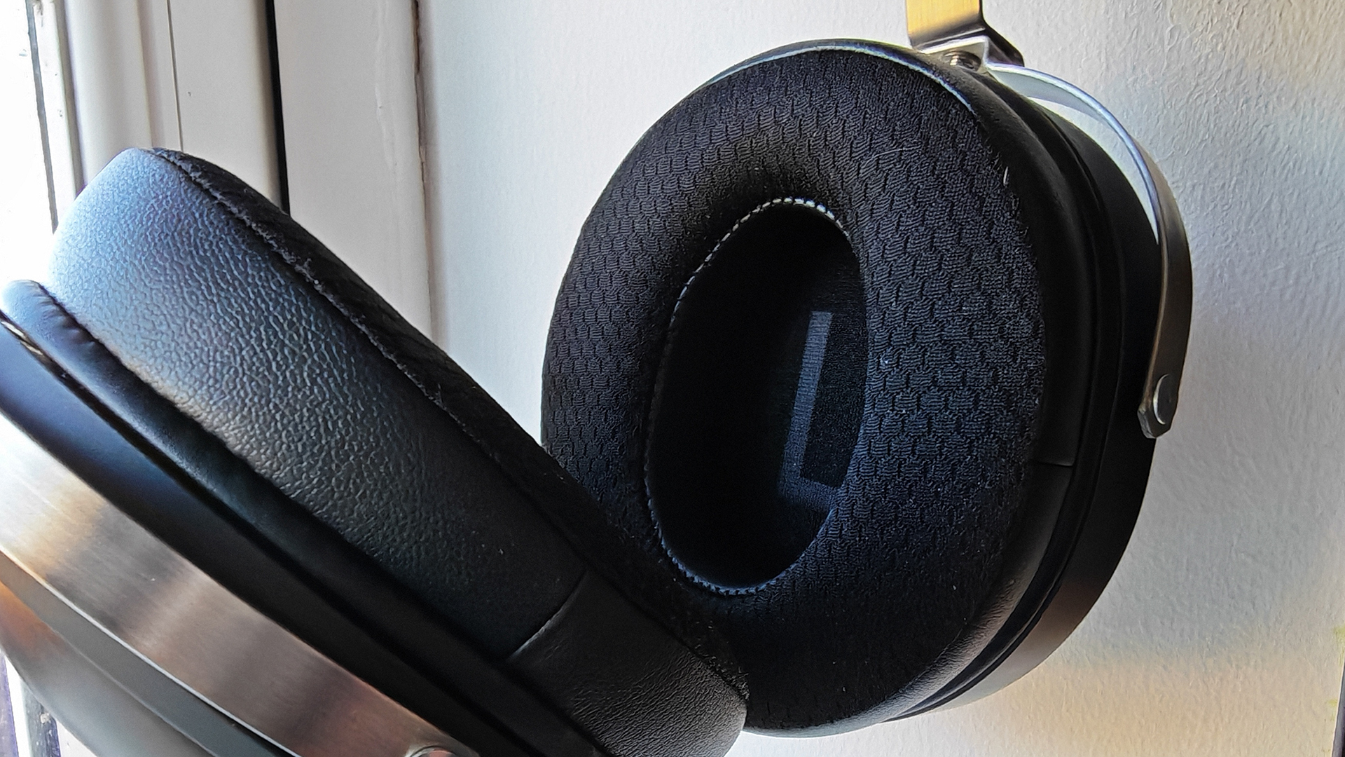 Various photos of the FiiO FT1 headphones, in a home office. 