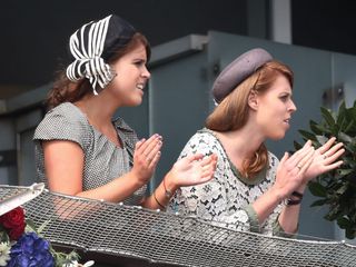 Princesses Eugenie and Beatrice watch the Derby races in honour of the late Queen Elizabeth's Diamond Jubilee