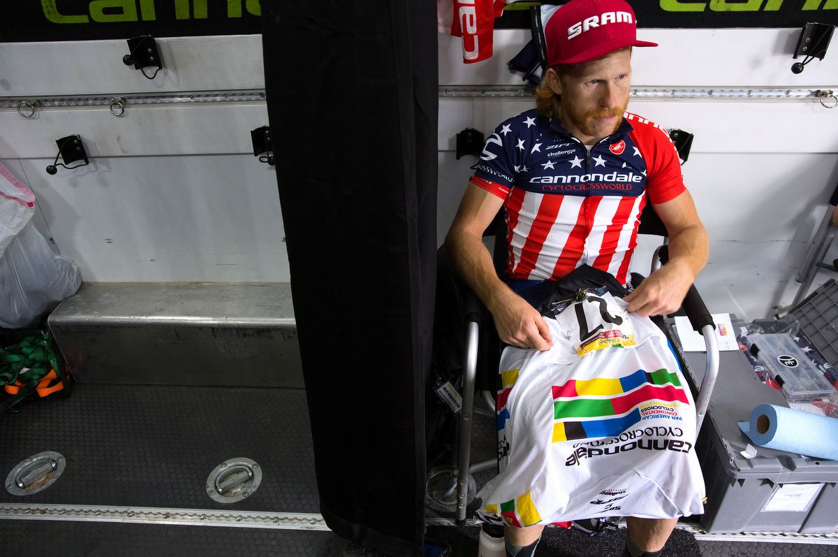 American champion Stephen Hyde pinning his race numbers to his Pan-American champions jersey