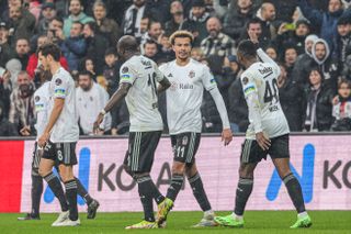 Dele Alli celebrates a goal against Alanyaspor with Besiktas team-mates in January 2023.