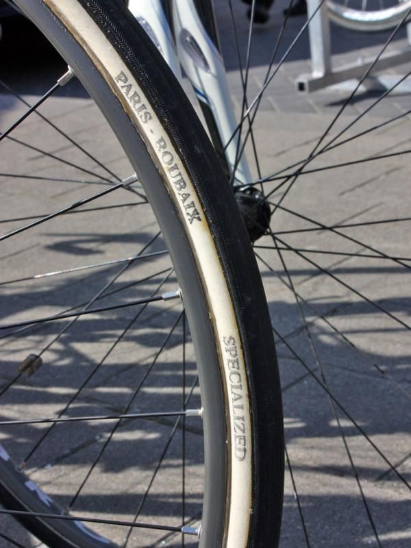 These giant 27mm-wide Paris-Roubaix tires may be badged as Specialized but the stamps are telltale signs they're made by FMB.