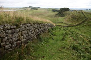Hadrian's Wall was built by the Romans to keep out the unconquered people of Scotland.