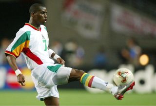 Henri Camara in action for Senegal at the 2002 World Cup.