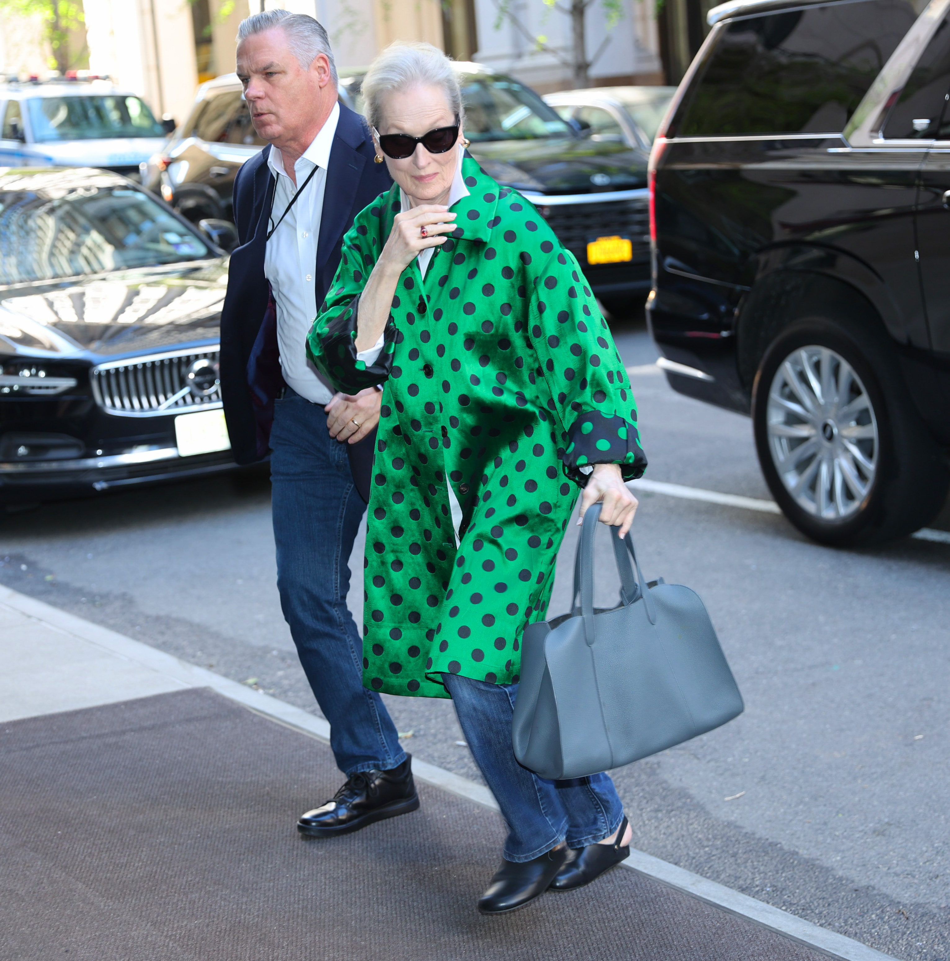 Meryl Streep in polka dot jacket straight leg jeans and clogs