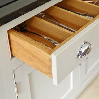 wooden drawer with metal handle