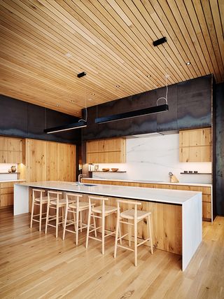 red rock house interior of kitchen with large island