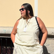 Editor Ana Escalante wears butter yellow top and matching skirt on the streets of Madrid, Spain.