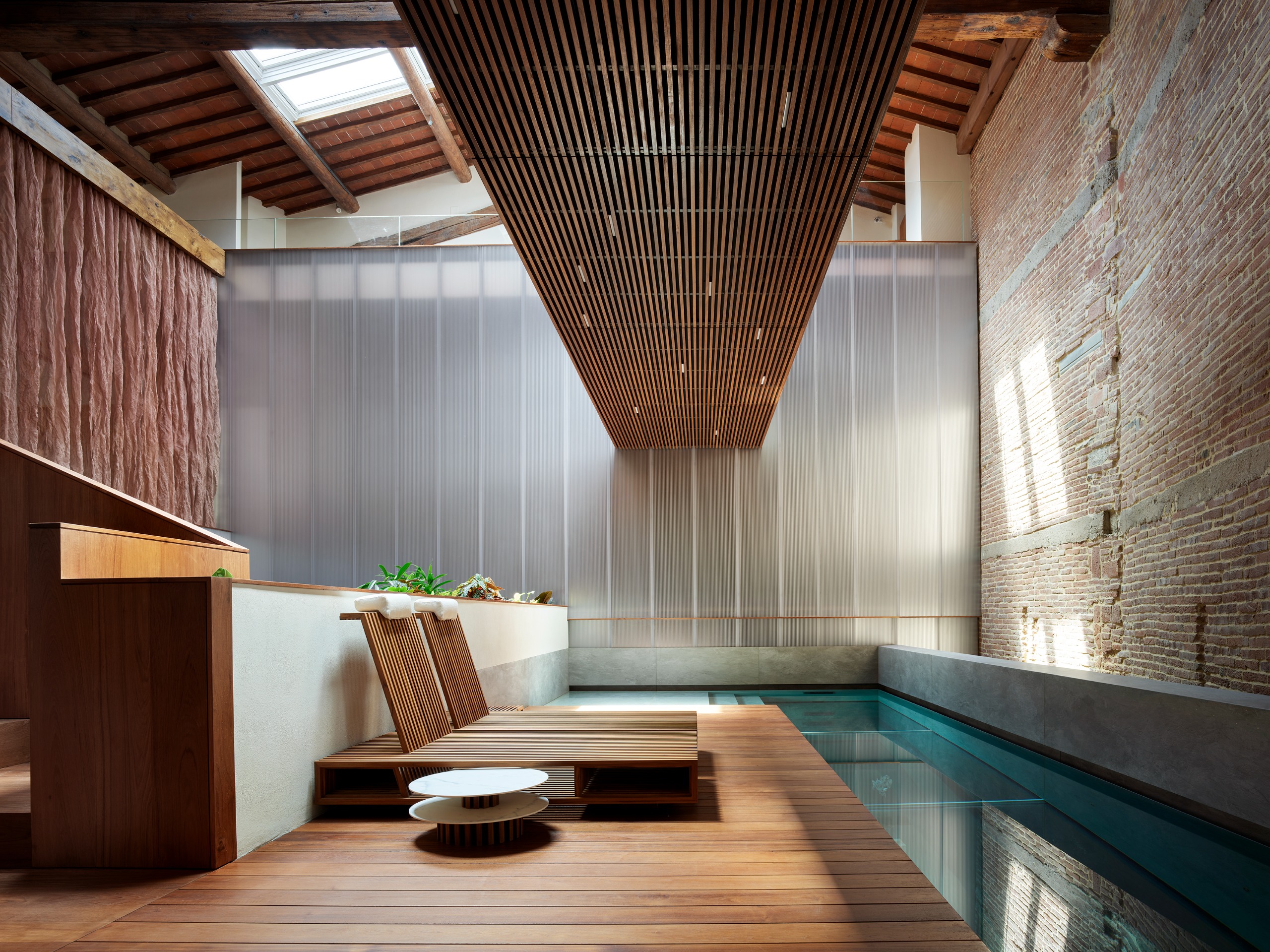 The architect's home features a suspended swimming pool