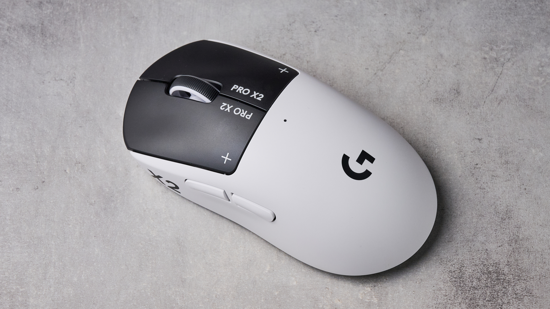 Top-down view of Logitech G Pro X2 Superstrike on white desk