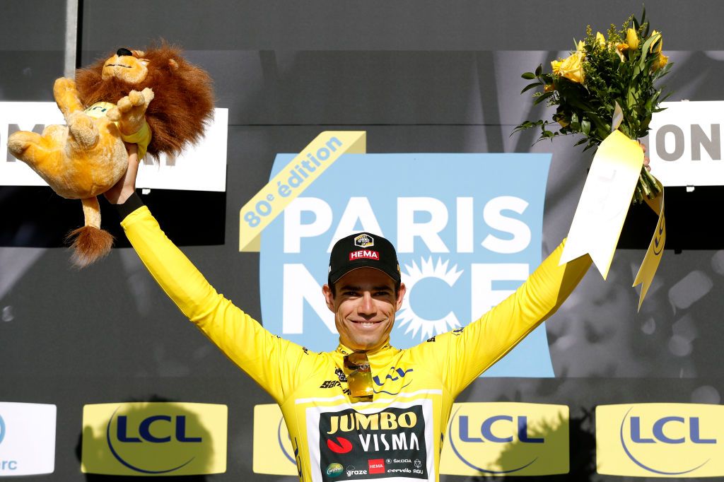 MONTLUCON FRANCE MARCH 09 Wout Van Aert of Belgium and Team Jumbo Visma celebrates winning the yellow leader jersey on the podium ceremony after 80th Paris Nice 2022 Stage 4 a 134km individual time trial from Domrat to Montluon ParisNice WorldTour on March 09 2022 in Montlucon France Photo by Bas CzerwinskiGetty Images