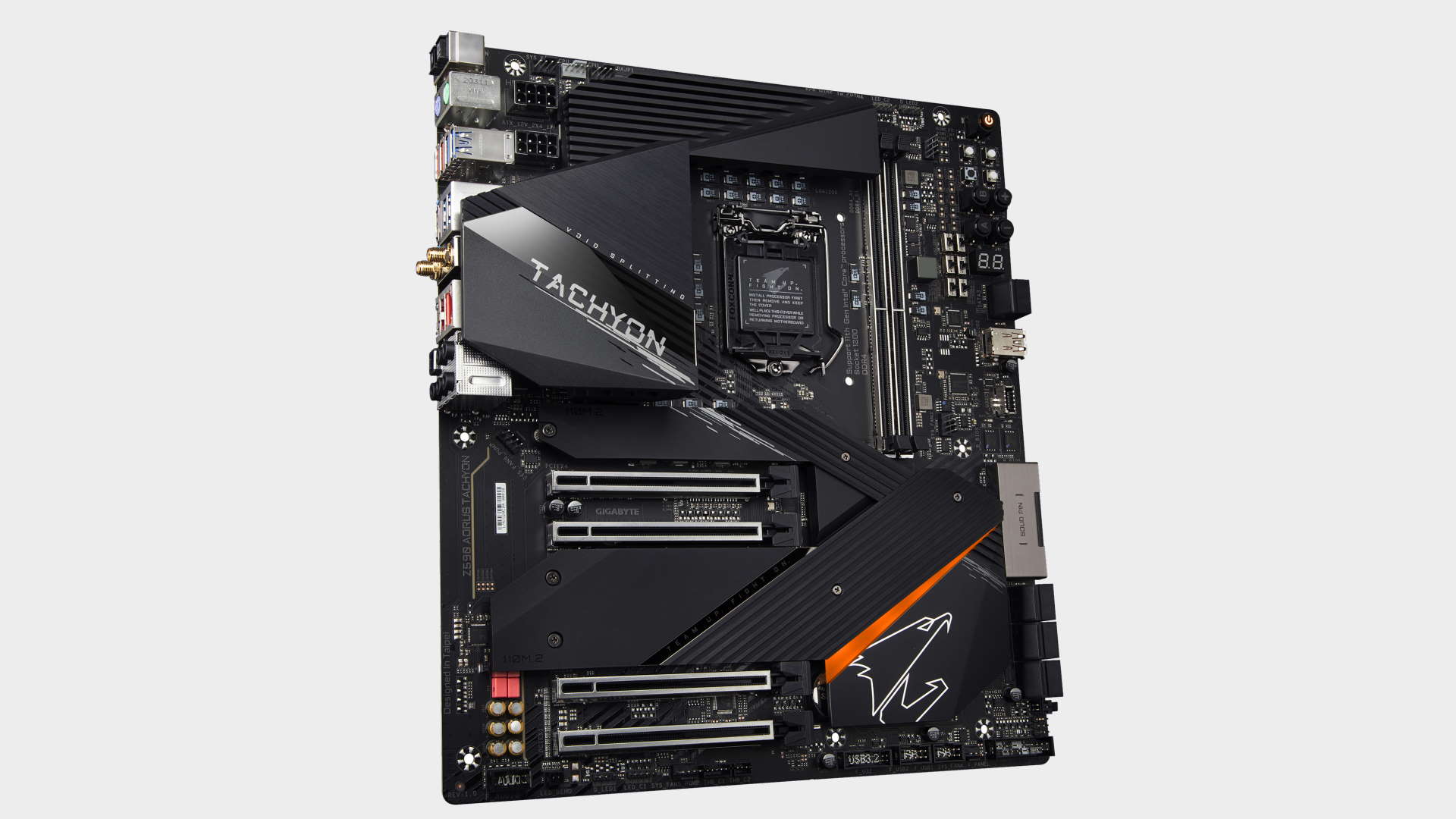 Gigabyte Z590 Aorus Tachyon gaming motherboard top down on a grey background