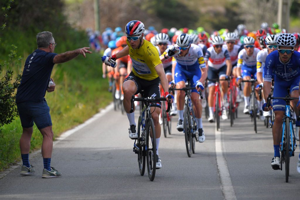 ALTO DA FIA MONCHIQUE PORTUGAL FEBRUARY 20 Fabio Jakobsen of The Netherlands and Team Deceuninck Quick Step Yellow Leader Jersey Feed Zone Tacx bottle Soigneur Peloton during the 46th Volta ao Algarve 2020 Stage 2 a 1839 km stage from Sagres Vila do Bispo to Alto da Fia 884m Monchique VAlgarve2020 on February 20 2020 in Alto da Fia Monchique Portugal Photo by Tim de WaeleGetty Images