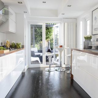 white kitchen with glass doors