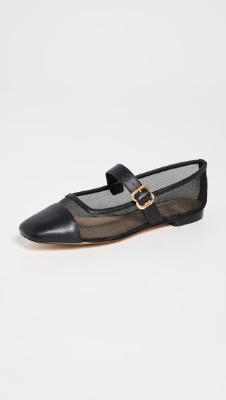 black mesh flats with a leather cap toe and leather strap