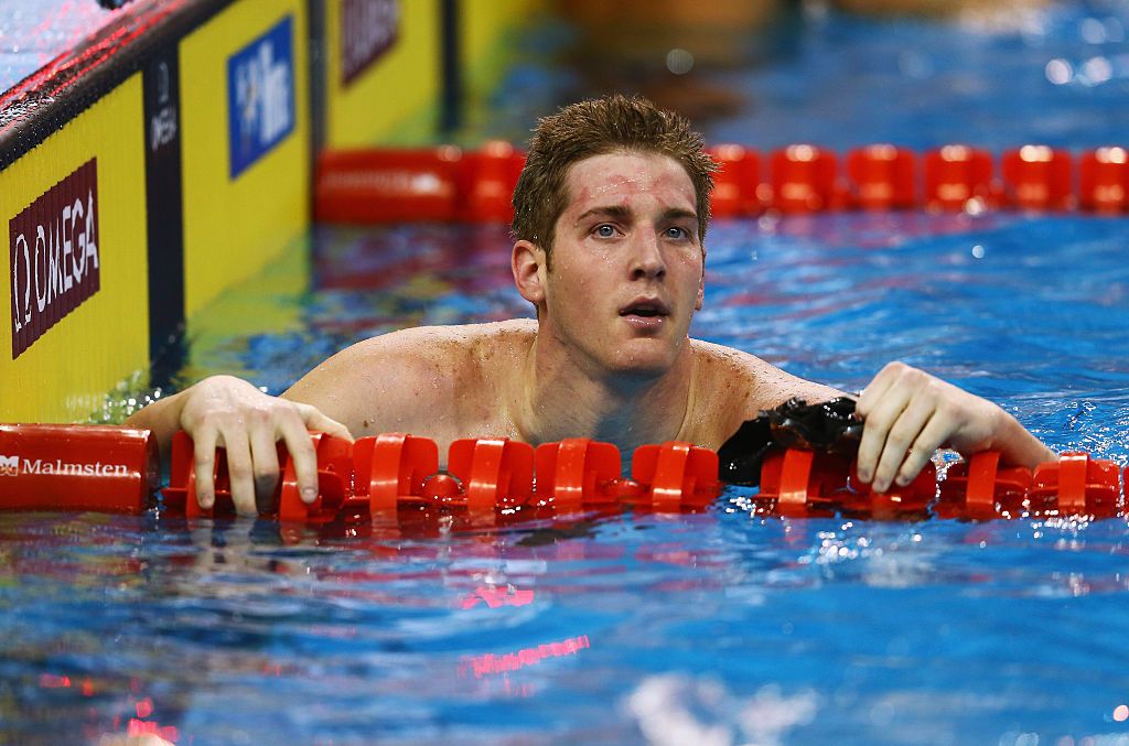 U.S. swimmer Jimmy Feigen to pay $11,000 to leave Brazil