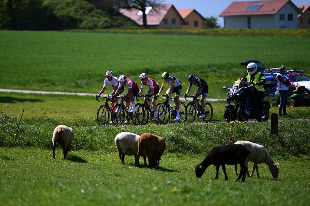 ROMONT SWITZERLAND APRIL 27 A general view of Julius Johansen of Denmark and Team Intermarch Wanty Gobert Matriaux Thomas Champion of France and Team Cofidis Tim Naberman of Netherlands and Team DSM Antoine Debons of Switzerland and Team Switzerland and Valre Thibaud of Switzerland and Team Switzerland compete in the breakaway passing through a landscape during the 75th Tour De Romandie 2022 Stage 1 a 178km stage from La Grande Beroche to Romont 777m TDR2022 on April 27 2022 in Romont Switzerland Photo by Dario BelingheriGetty Images