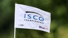 A white ISCO Championship golf flag