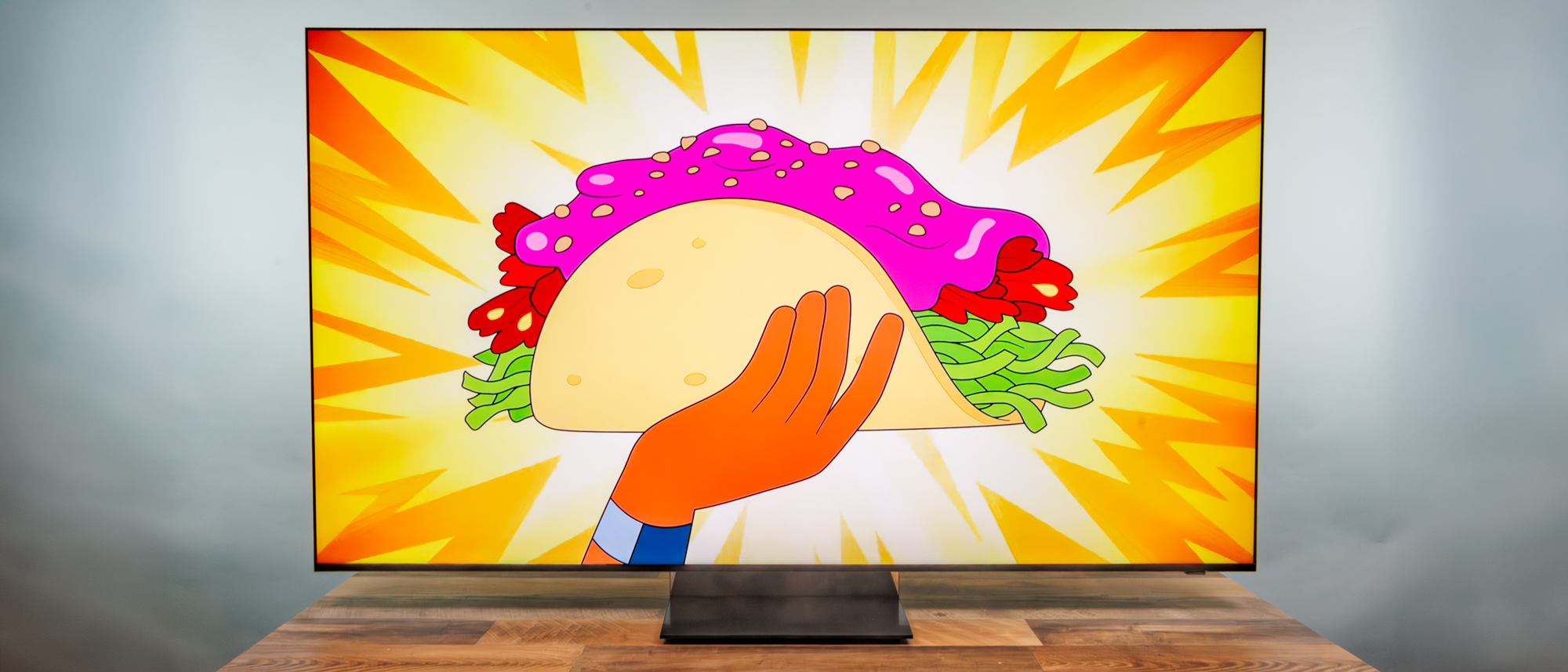 A Samsung R95H Micro RGB TV on a desk
