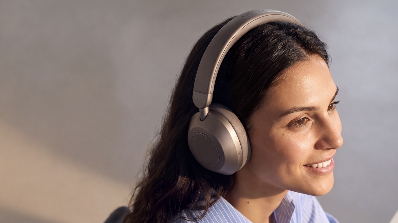 Anker Soundcore Space 2 Pro headphones on dark haired woman in shirt