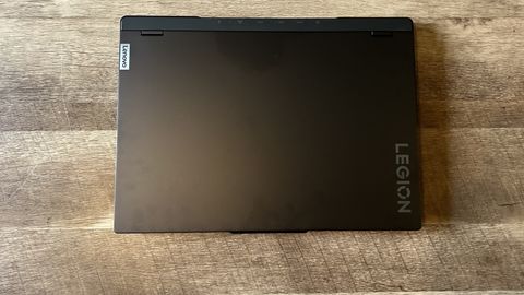 Lenovo Legion Pro 7i gaming laptop on a wooden table