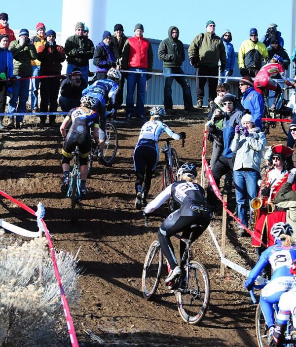 Riders on a steep climb.