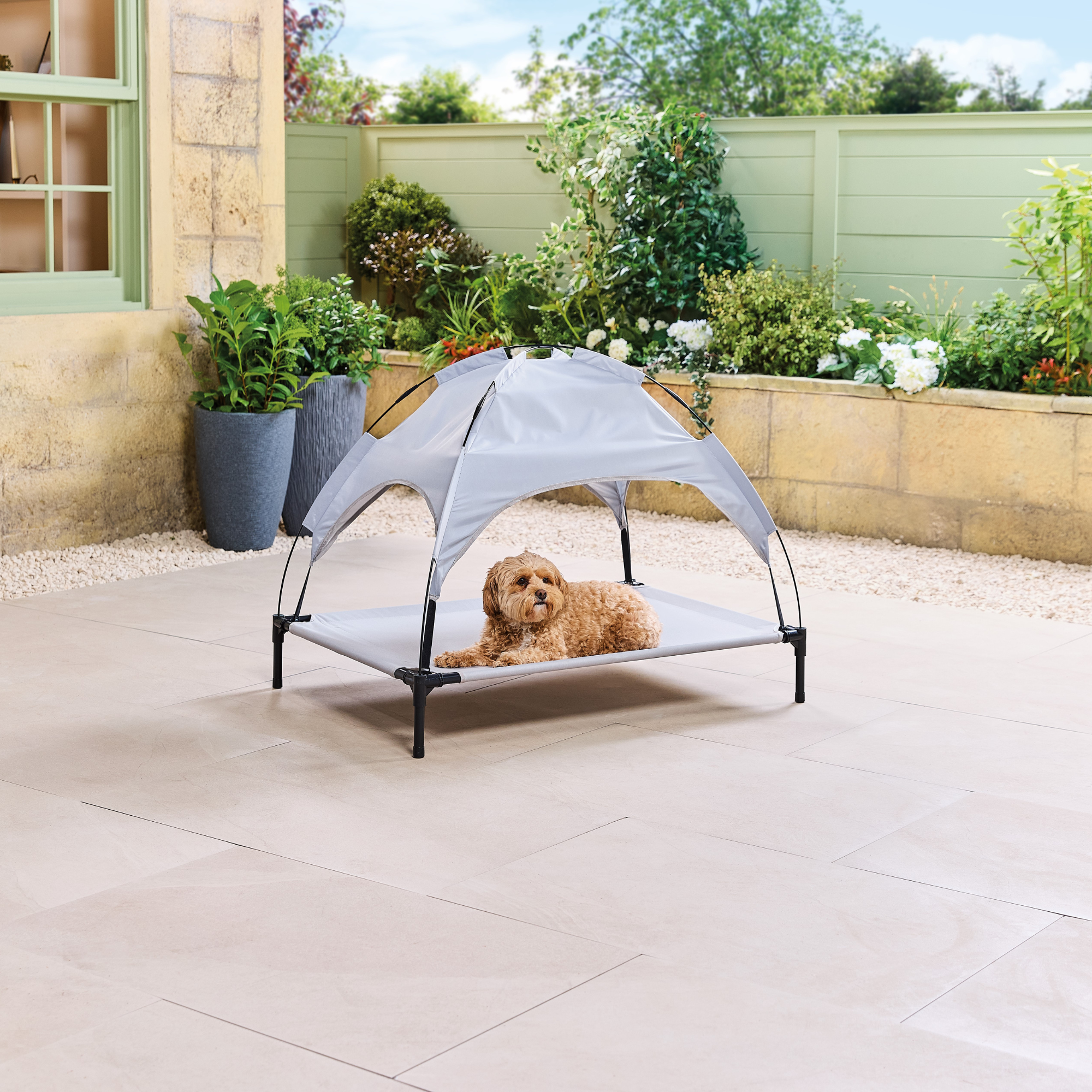 Aldi pet bed on a patio.