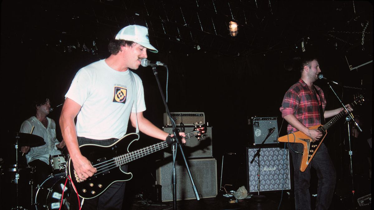 Greg Norton onstage with Hüsker Dü