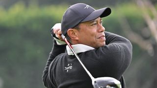 Tiger Woods takes a shot at the Genesis Invitational pro-am