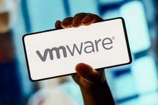 VMware logo displayed on a smartphone in black lettering on white background