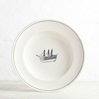 white bowl with ship logo